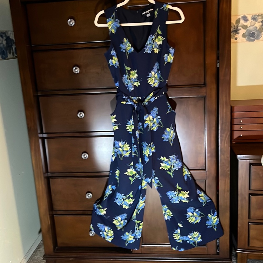 Sleeveless jump suit. Worn once in excellent preowned condition.